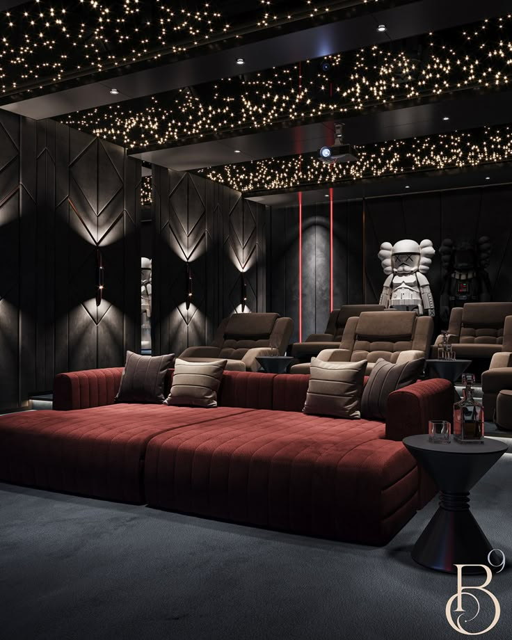 Luxury home theatre with fiber-optic star ceiling and velvet daybed loungers